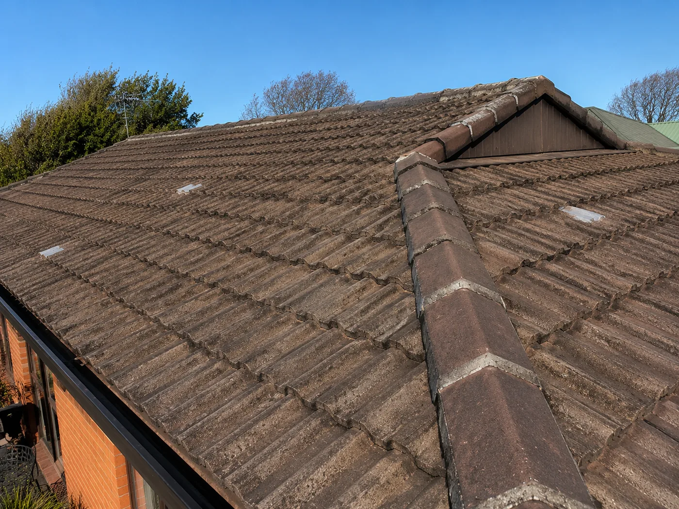 Weathered tile roof before painting in Christchurch
