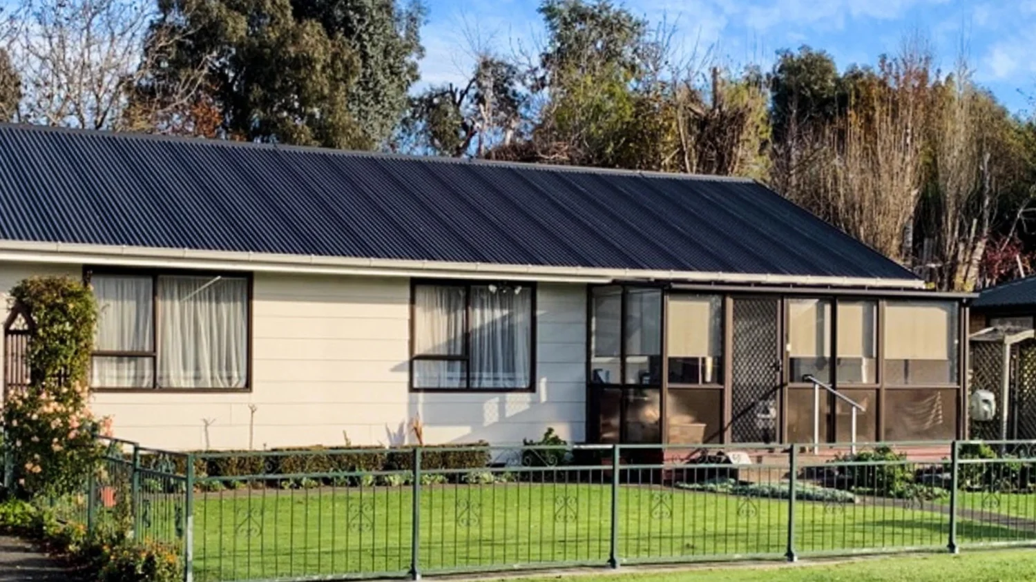 Repainted exterior of a Canterbury home with charcoal roof