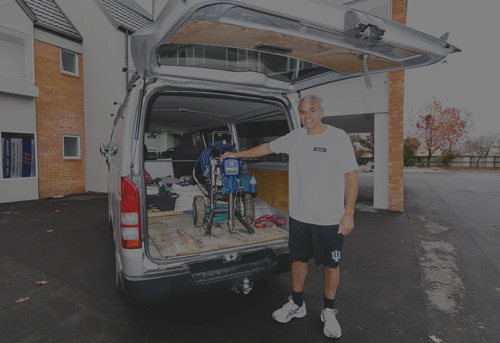 Mason, owner of Mason Wairau Painters, on site in Christchurch